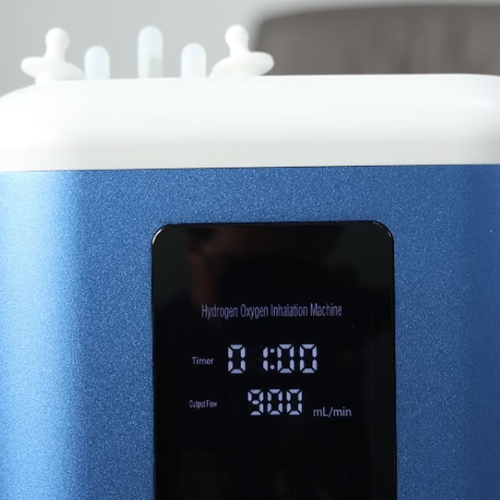 Displayet viser 900 mL/min og økttimeren